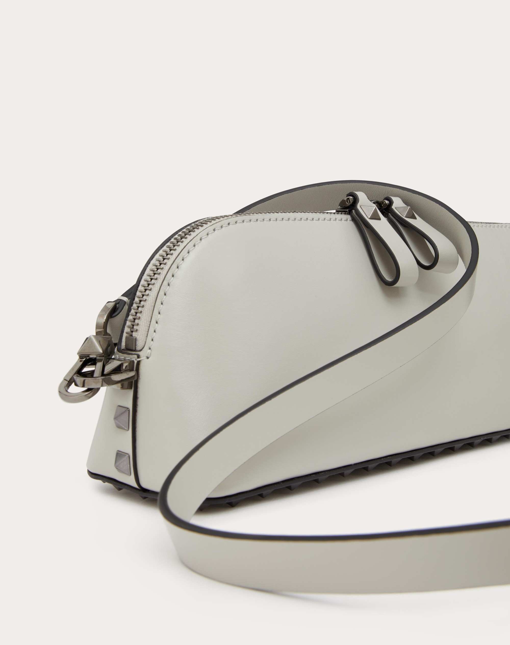 ROCKSTUD CALFSKIN CLUTCH - 8