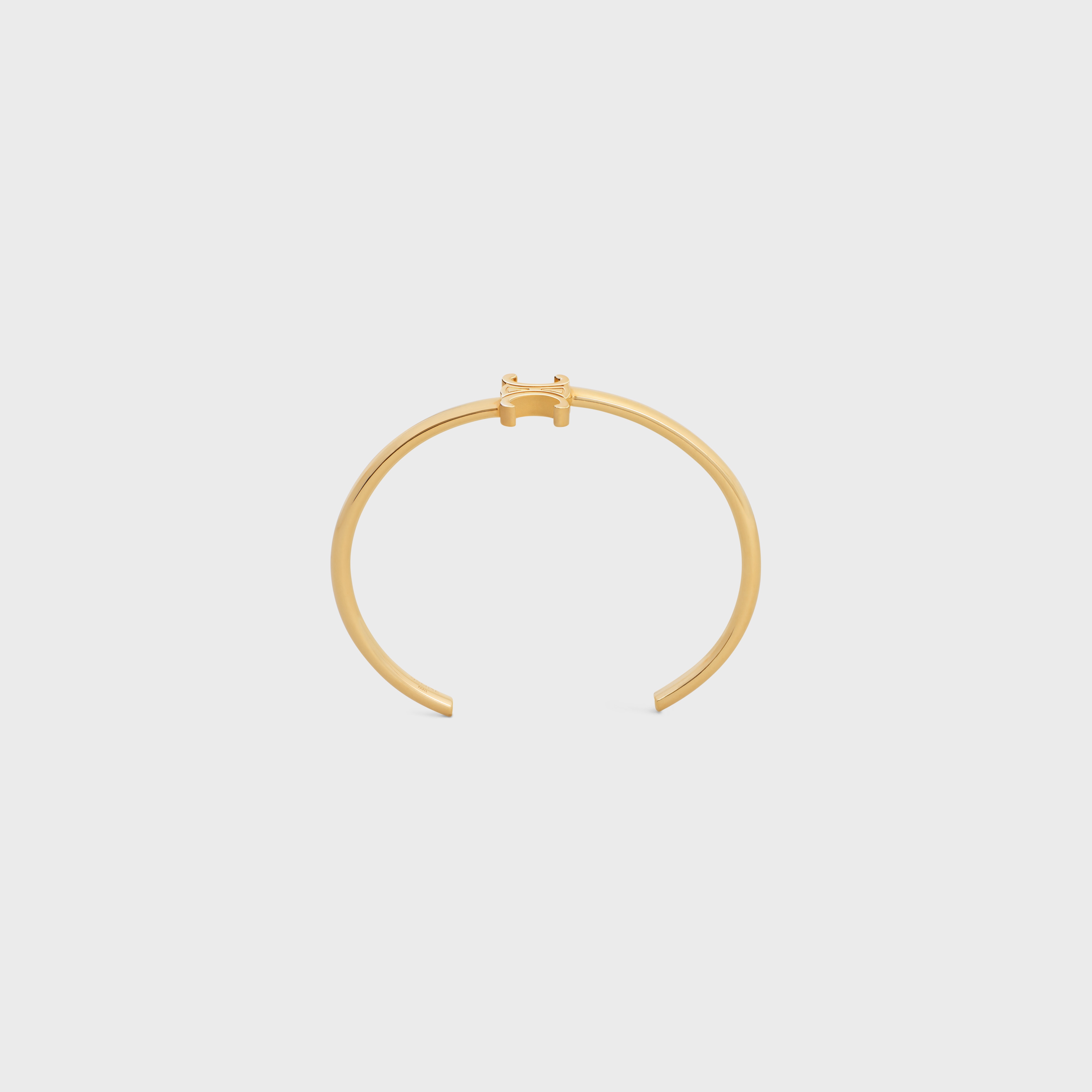 ブレスレット CELINE Triomphe asymmetric in brass cuff with gold finish CELINE Triomphe Asymmetric Cuff in Brass with Gold Finish