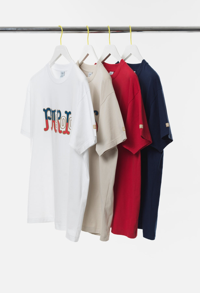 John Elliott JOHN ELLIOTT X OLYMPIC HERITAGE PARIS UNIVERSITY TEE outlook