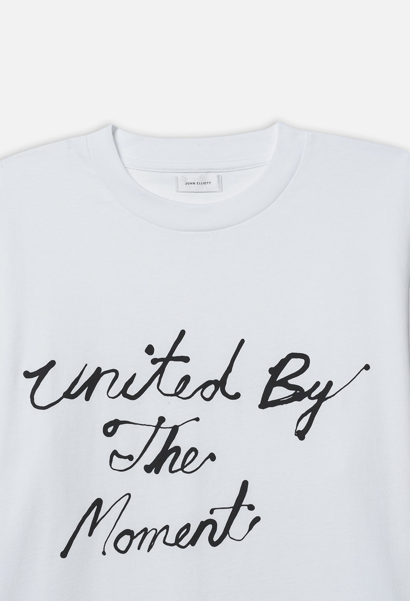 JOHN ELLIOTT UNITED BY THE MOMENT TEE 3