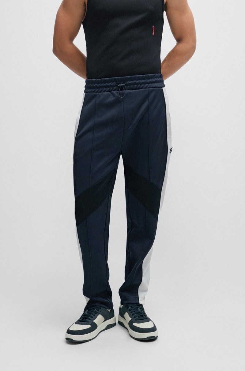 RELAXED-FIT TRACKSUIT BOTTOMS WITH COLOR-BLOCKING 2