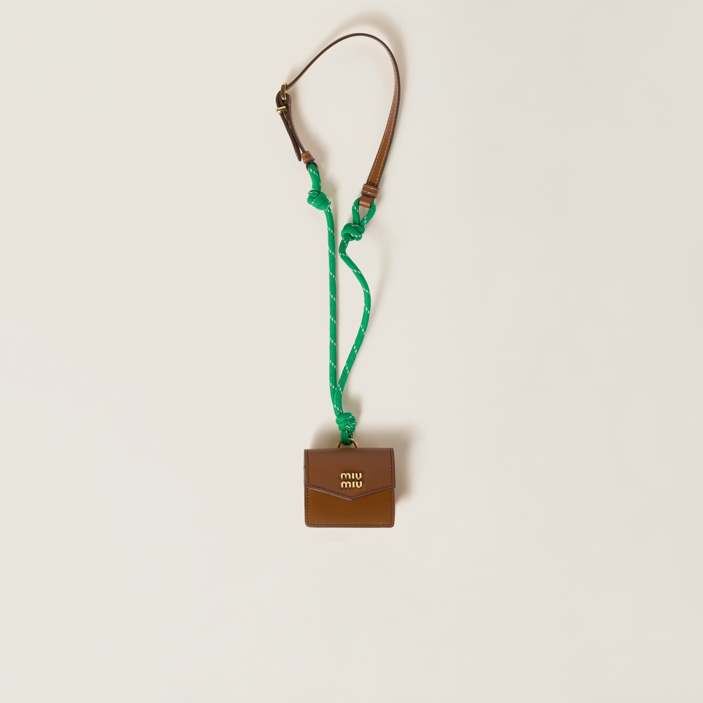 Leather, cord, and metal trick with mini-pouch - 1