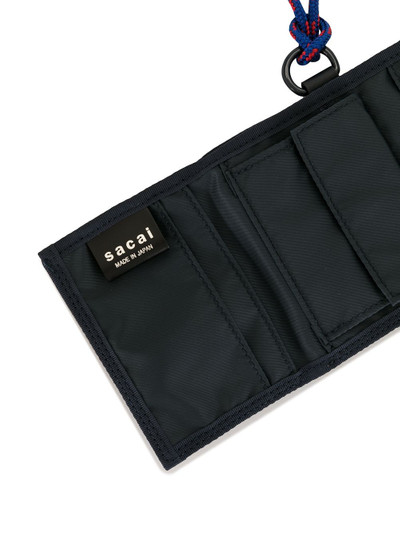 sacai tri-fold wallet with neck strap outlook