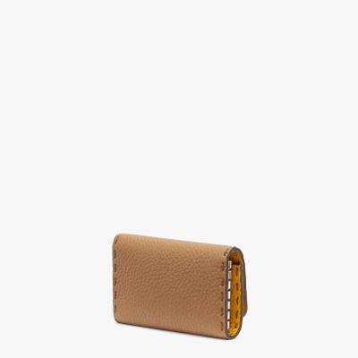 FENDI Key case with press stud closure. Made of beige Cuoio Romano leather. Yellow Cuoio Romano leather li outlook