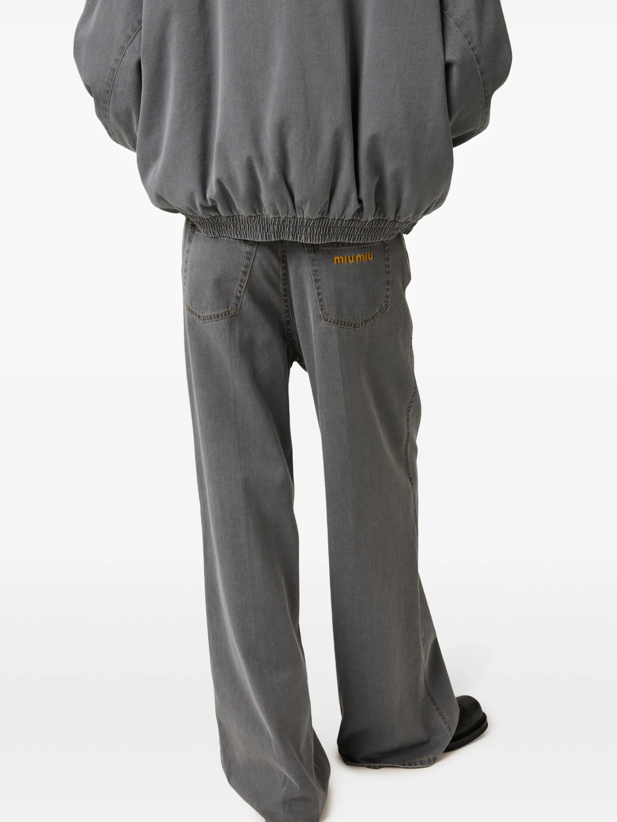 logo-embroidered wide-leg jeans - 4