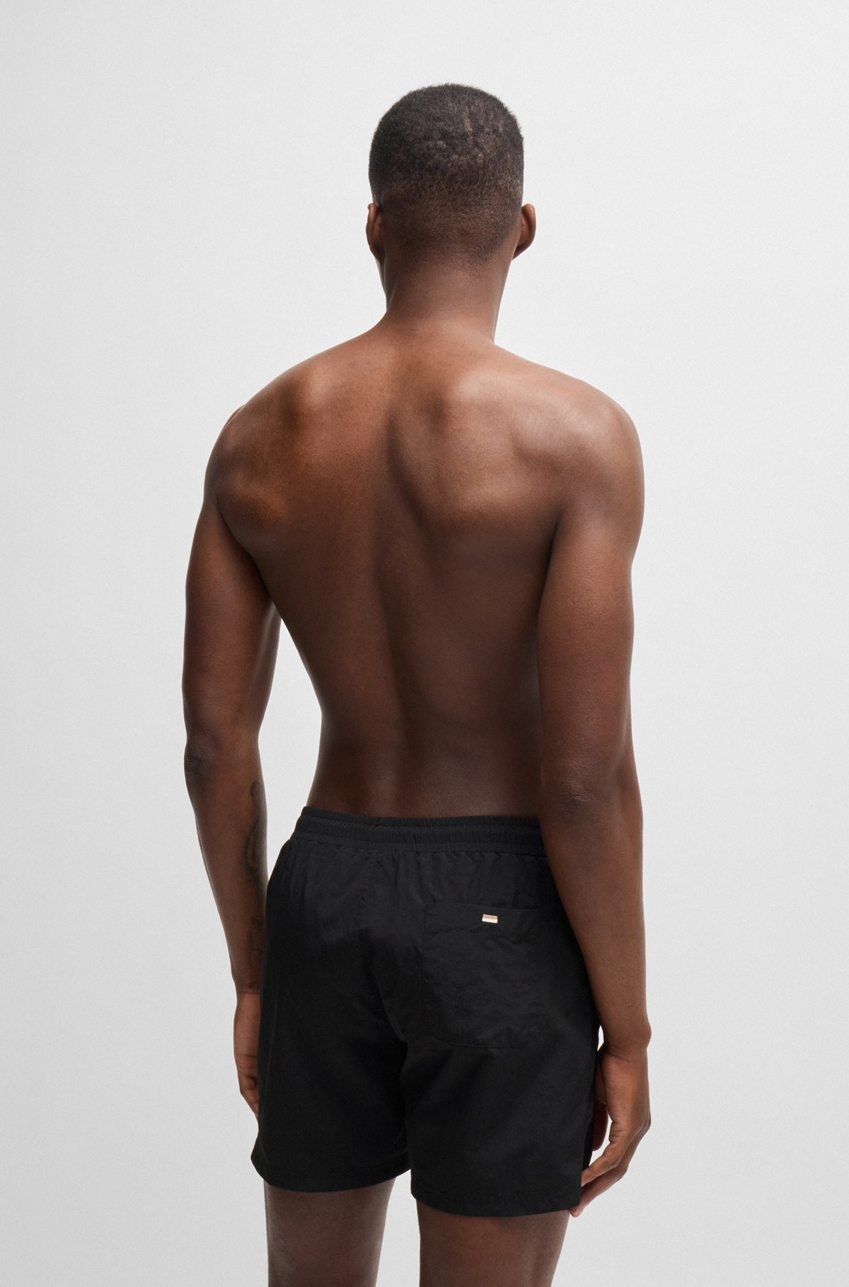 QUICK-DRYING SWIM SHORTS WITH METALLIC LOGO - 4