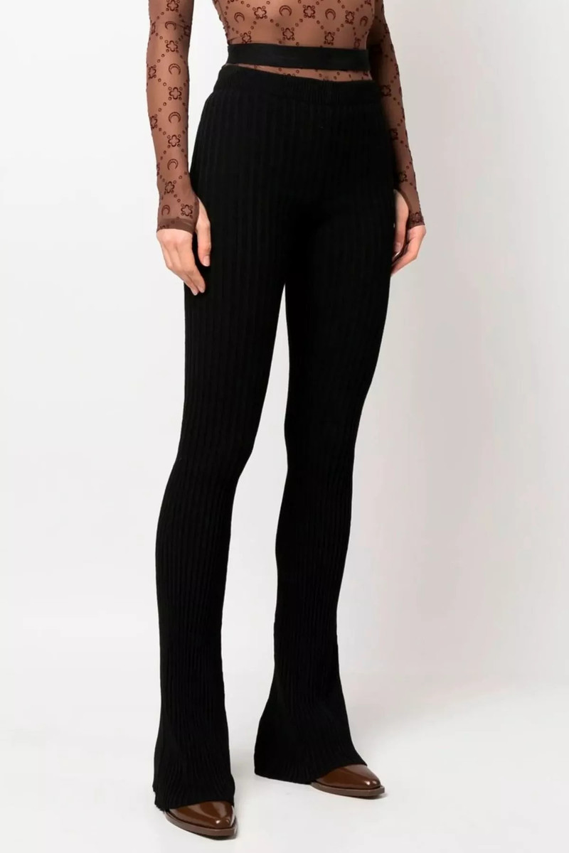 ANDREĀDAMO Ribbed flared trousers outlook