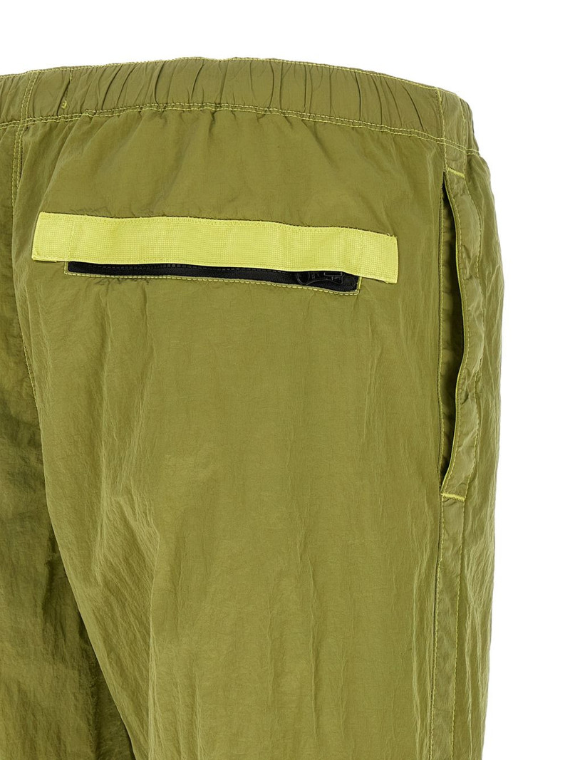 green track pants 4