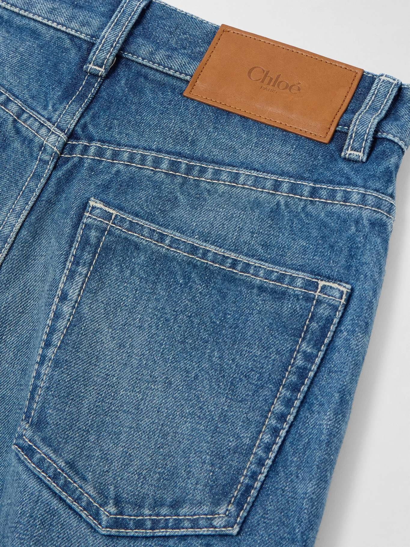 Chloé Frayed high-rise flared jeans Blue | REVERSIBLE