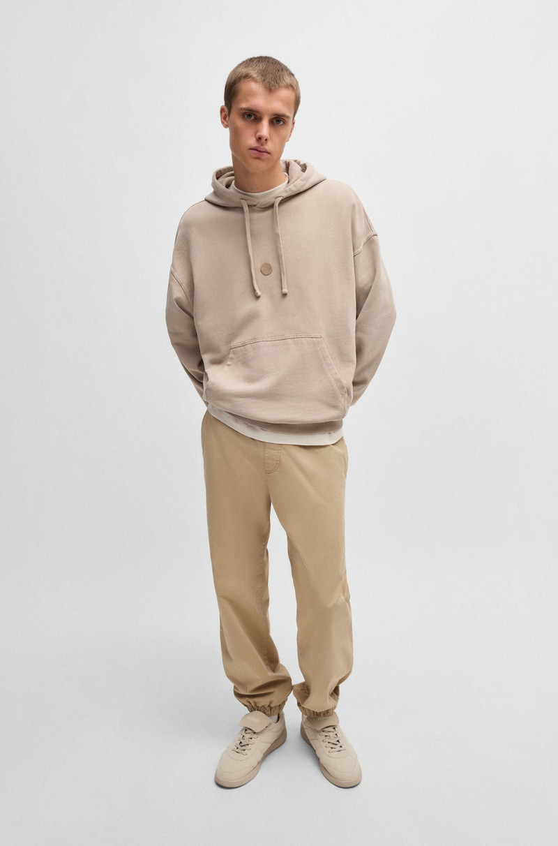 HUGO COTTON-TERRY HOODIE WITH A HAPPY HUGO LOGO BADGE outlook
