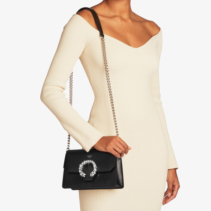 JIMMY CHOO Madeline Crossbody
Black Polished Grainy Leather Crossbody Bag with Crystal Buckle outlook