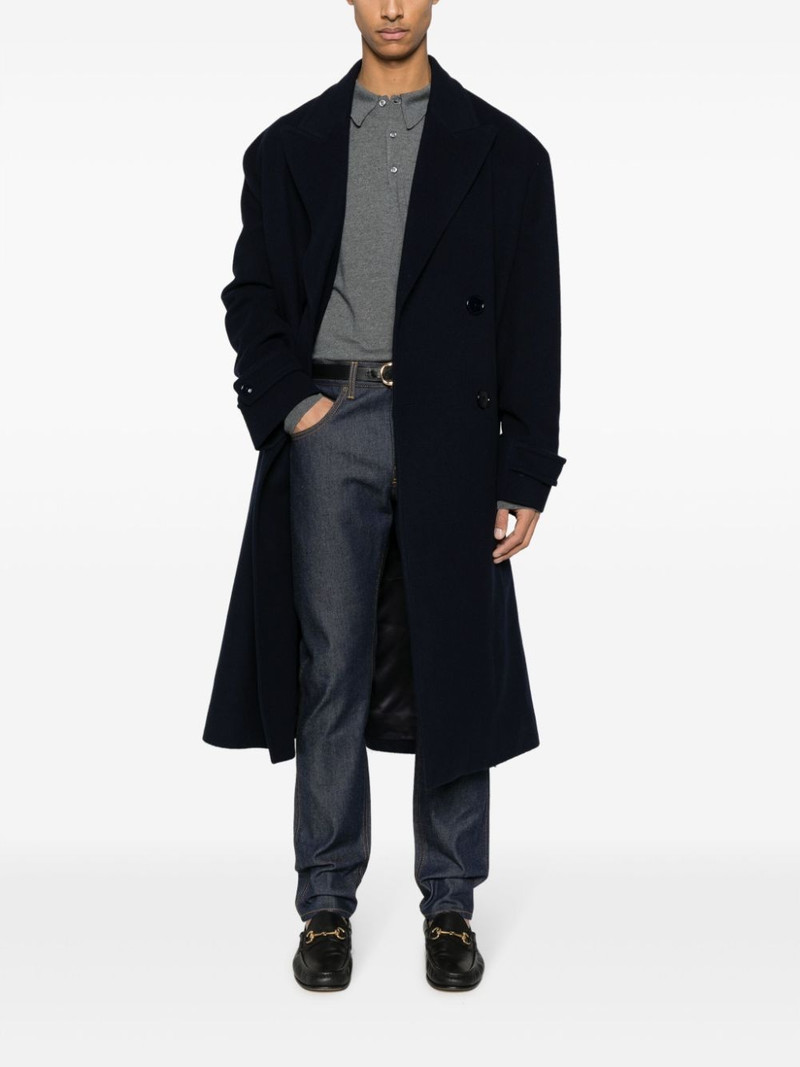 GUCCI mid-rise tapered-leg jeans outlook