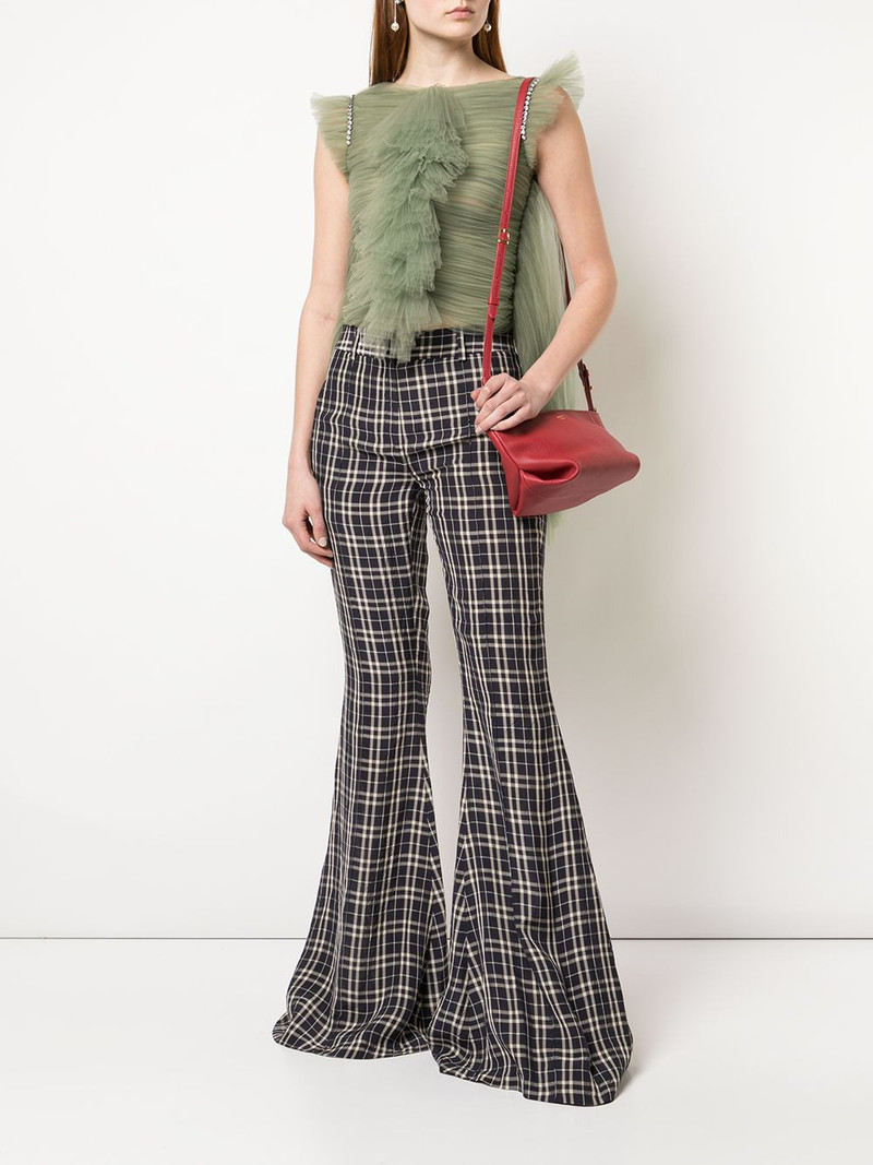 KHAITE Stockard check flared trousers outlook