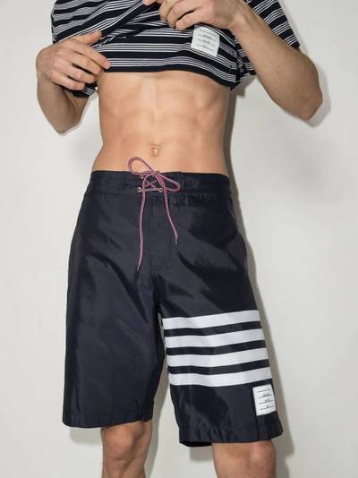 Thom Browne 4-Bar board shorts outlook