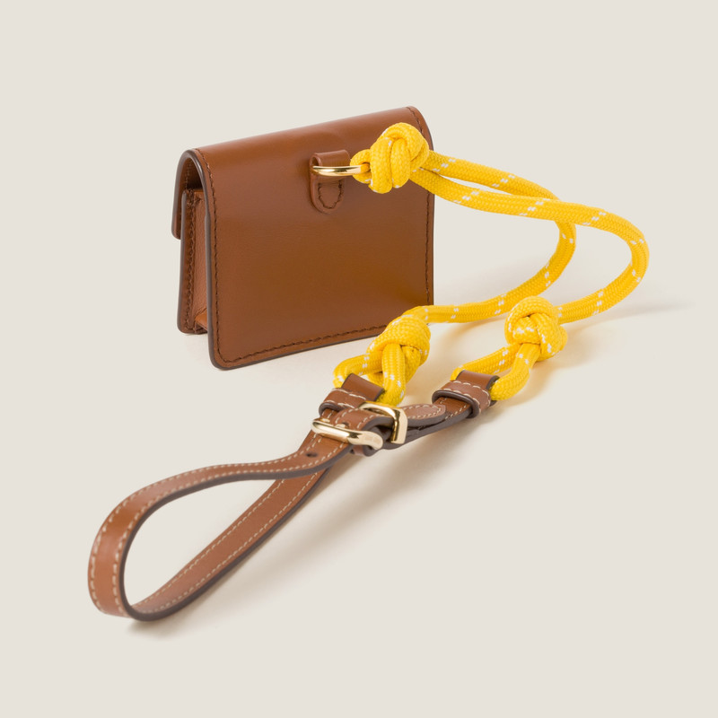 Miu Miu Leather, cord, and metal trick with mini-pouch outlook