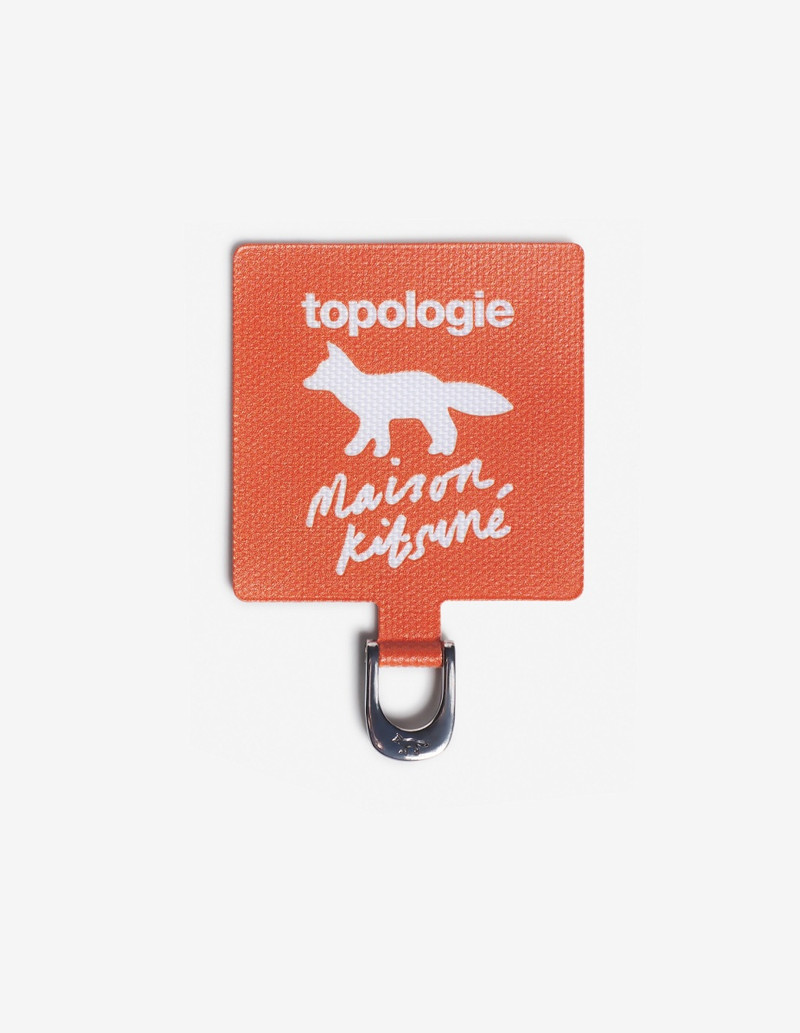 MAISON KITSUNE X TOPOLOGIE PHONE STRAP ADAPTER 1