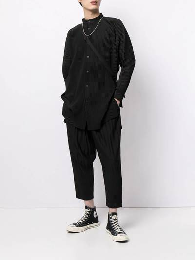 ISSEY MIYAKE pleated tapered-leg trousers outlook