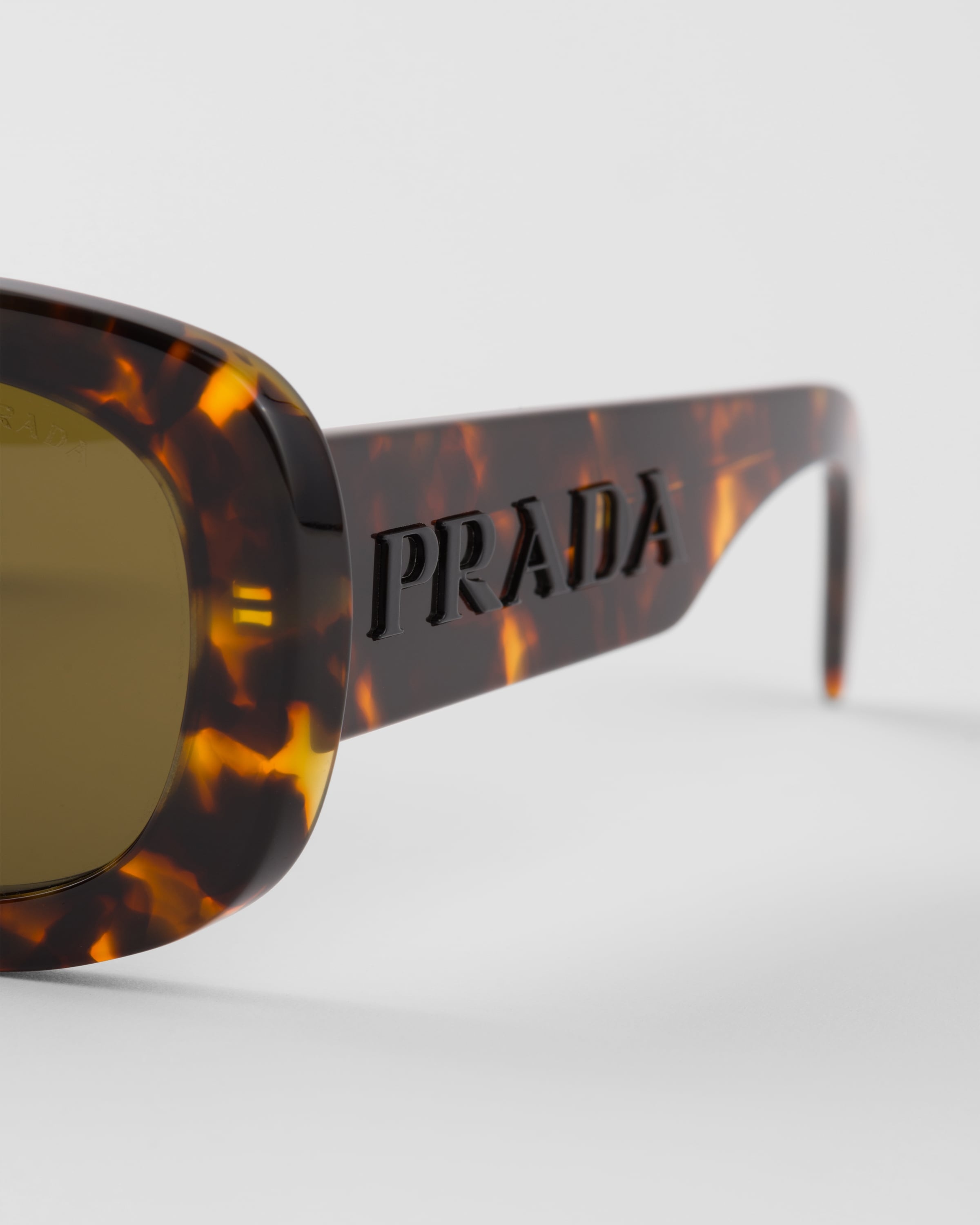 Prada Sunglasses with the Prada logo | REVERSIBLE