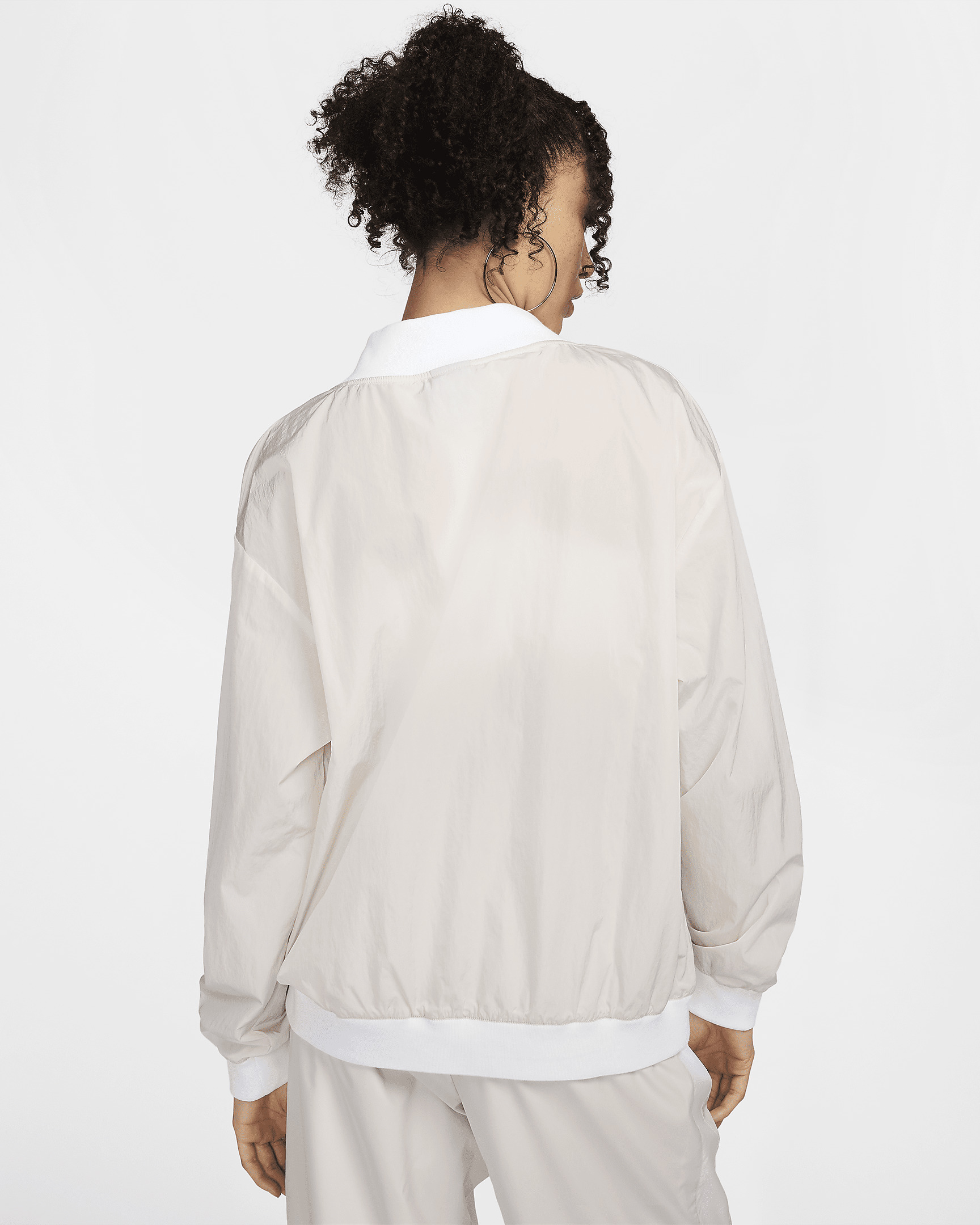 Nike Sportswear Essential Women's Loose UV Woven Long-Sleeve V-Neck Top - 2