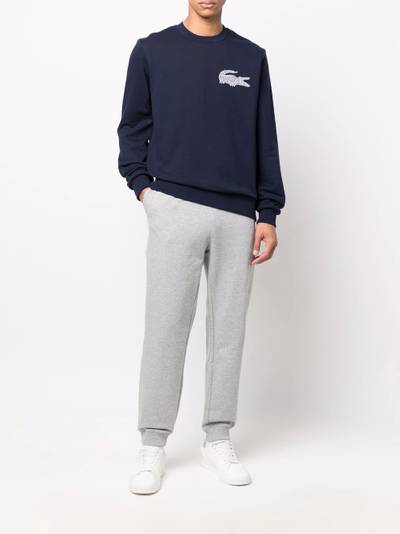 LACOSTE logo-patch detail trousers outlook