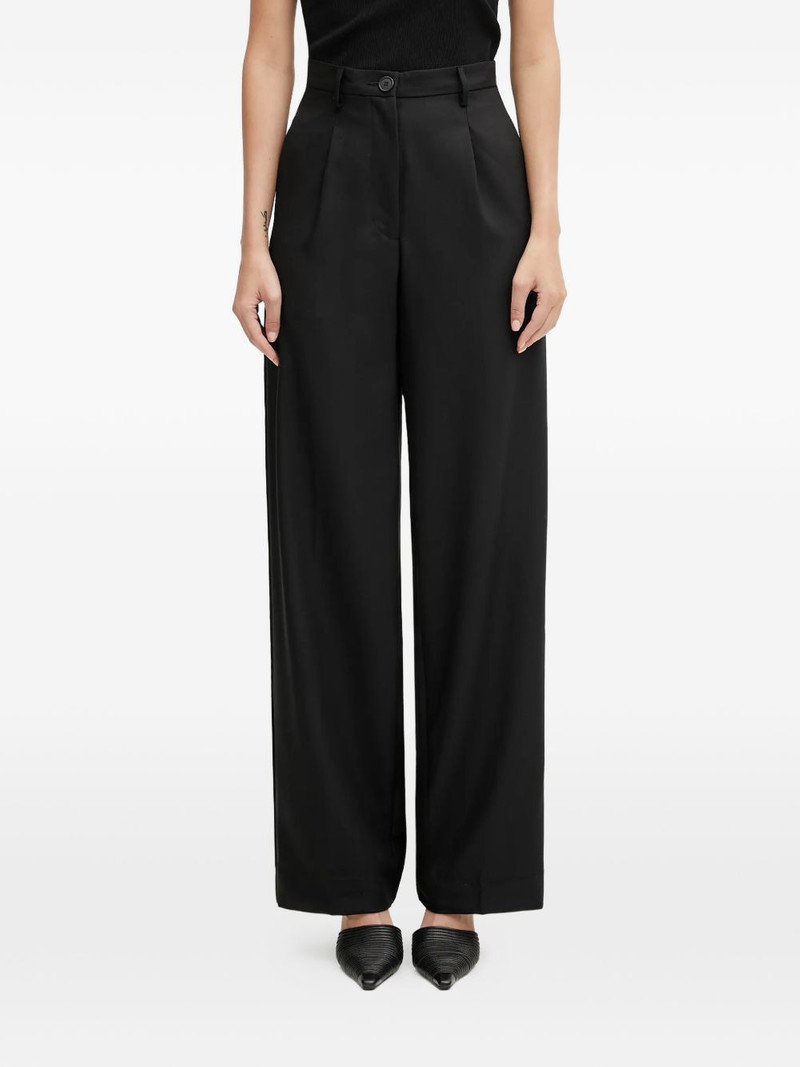 button pleated trousers 1