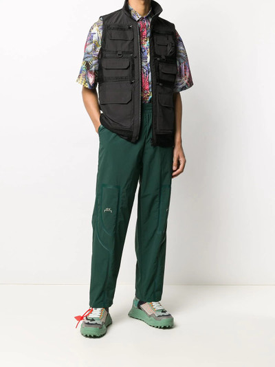 White Mountaineering multi-pocket mesh panel sleeveless jacket outlook