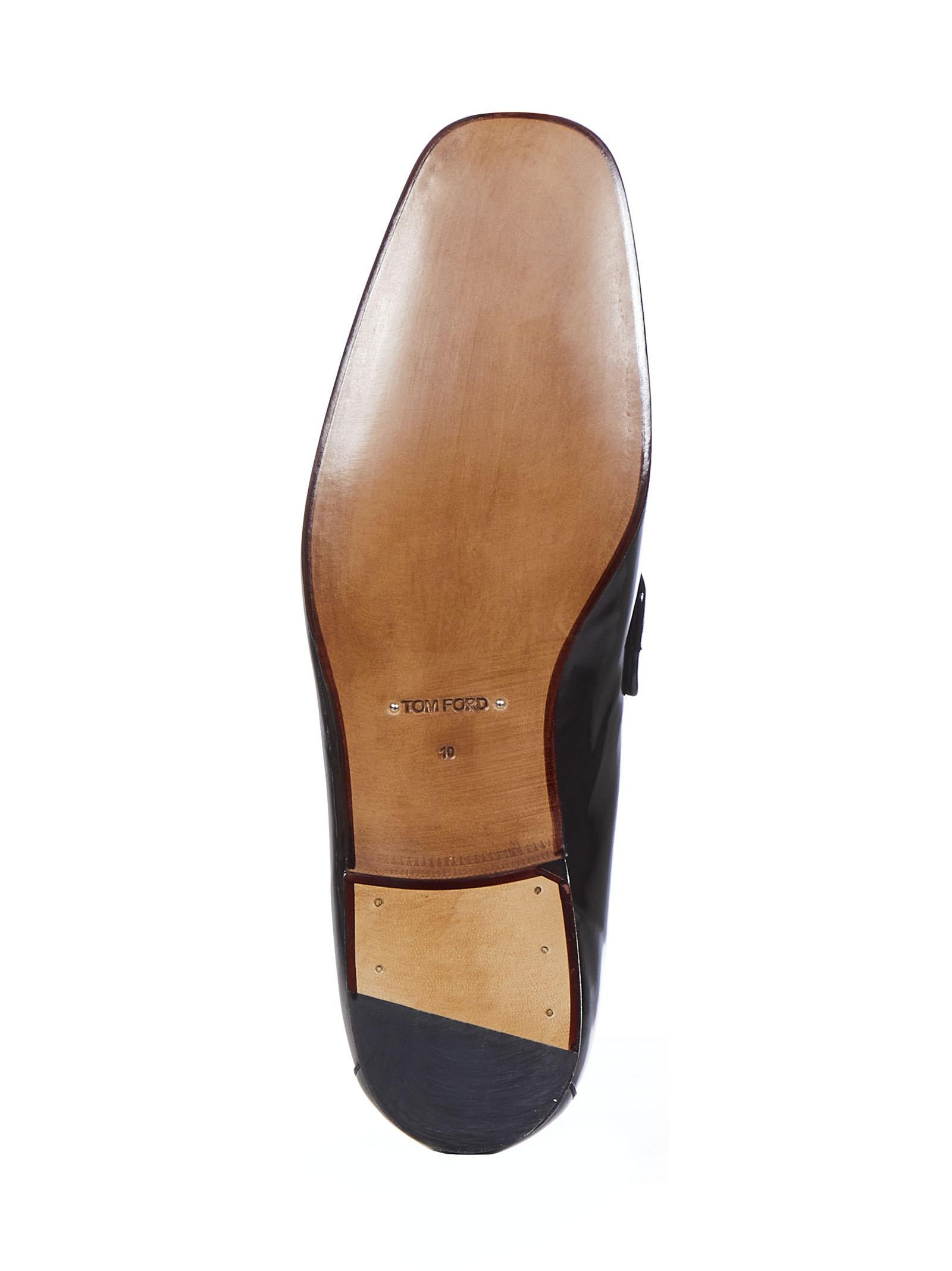 Chocolate-colored patent calfskin loafers with golden metal horsebit and tassels. - 4