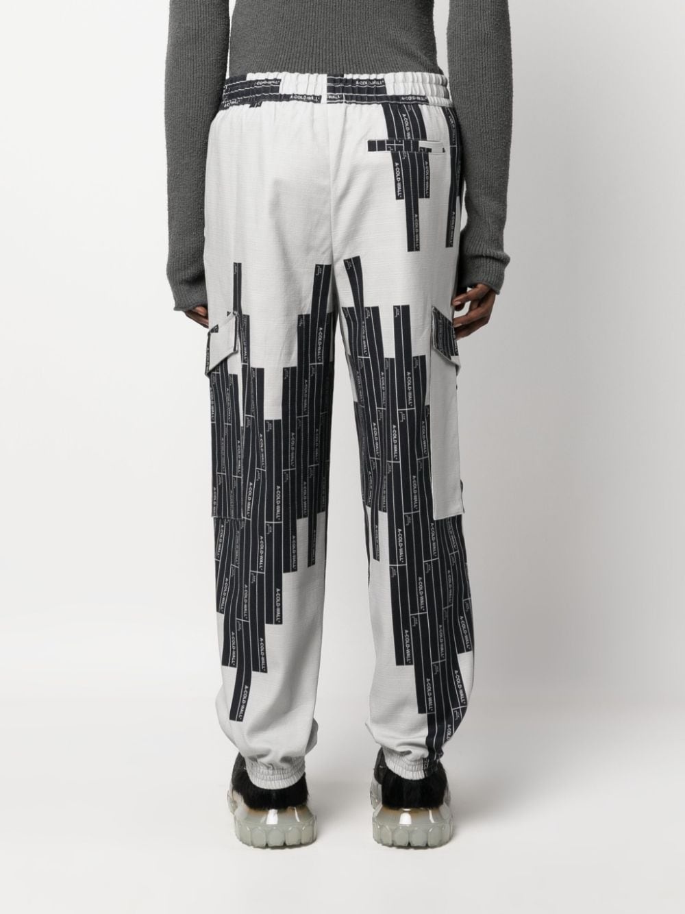 Vector-monogram tapered trousers - 4