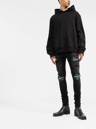 AMIRI ripped skinny jeans outlook