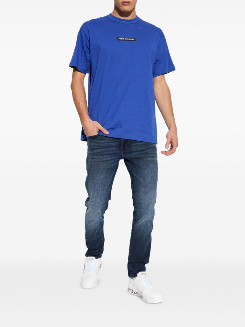 VERSACE JEANS COUTURE logo-patch jeans outlook