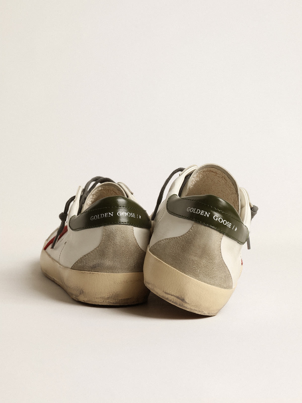 Golden Goose Super-Star with red suede star and green leather heel