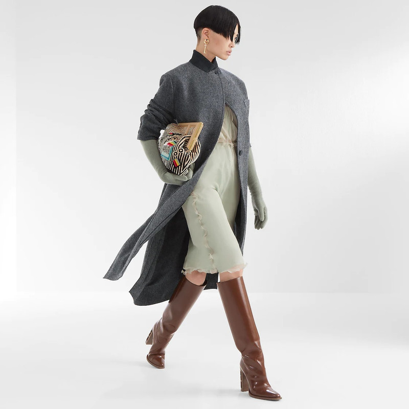 FENDI Medium Fendi First bag made of soft mink inlaid by hand with an abstract graphic motif. Oversized me outlook