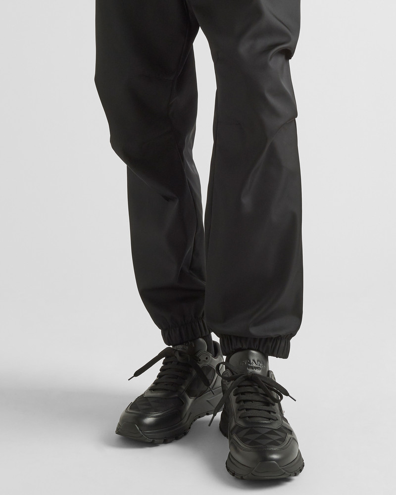 Prada Leather and Re-Nylon high-top sneakers outlook