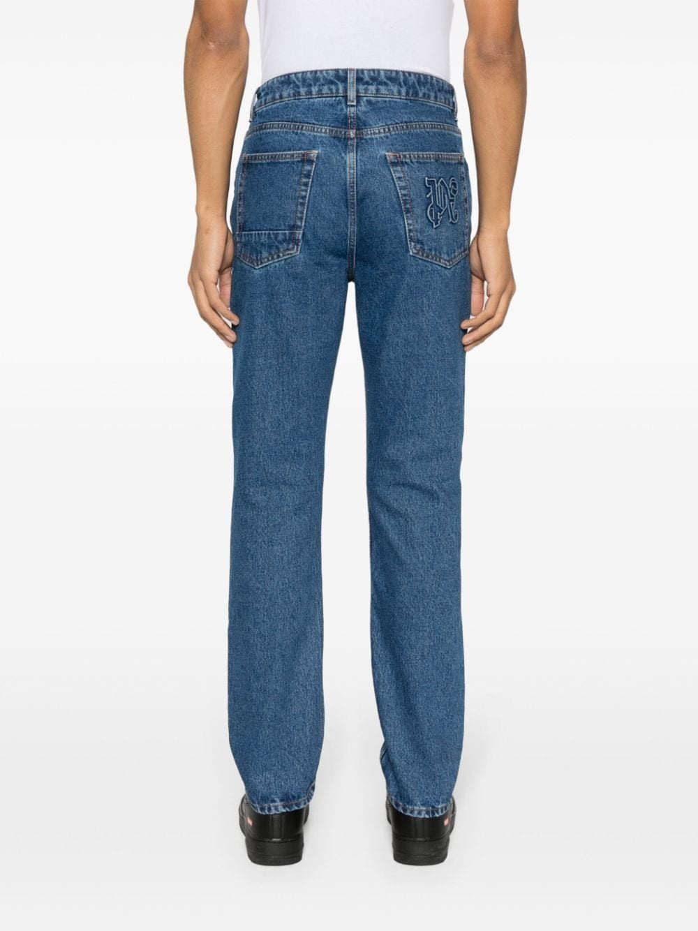 monogram-embossed straight-leg jeans - 4