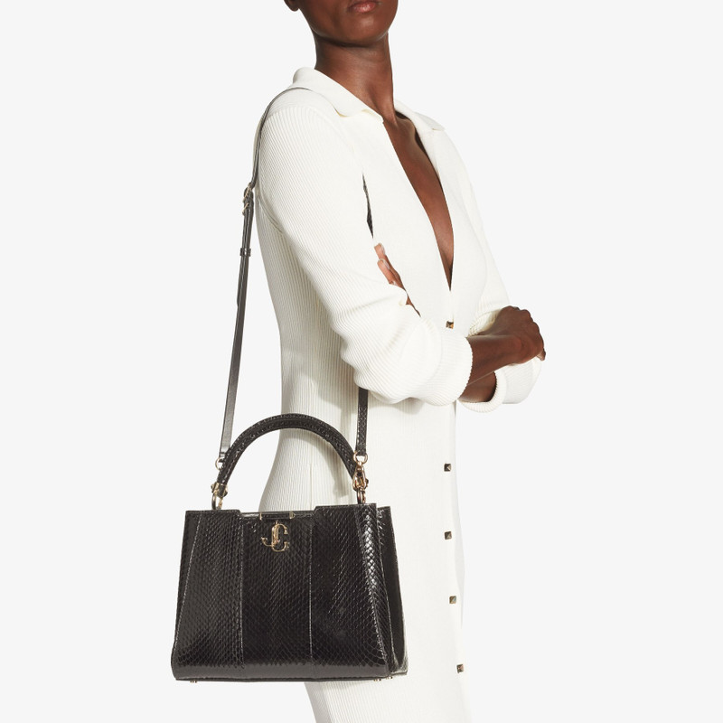 JIMMY CHOO Varenne Top Handle M
Black Elaphe Top Handle Bag with Light Gold JC Emblem outlook