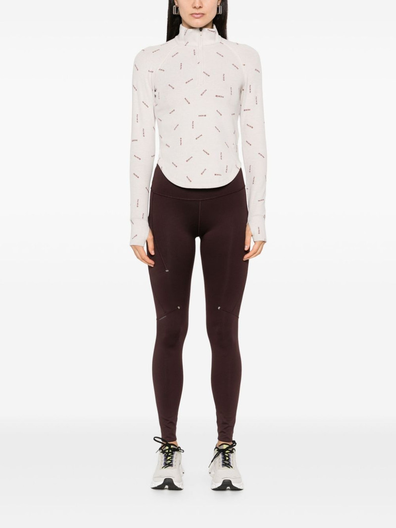 Nike half-zip logo-print top outlook
