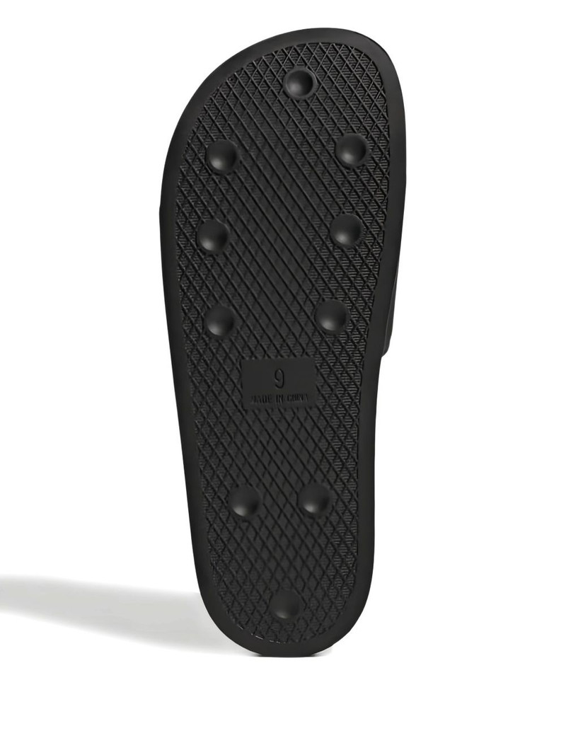 Adilette "André Saraiva The World Needs Love" slides 3