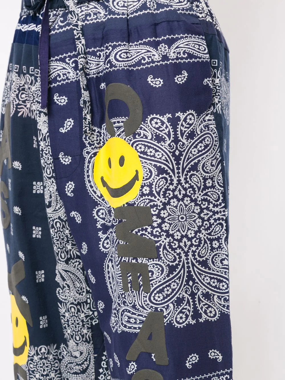 paisley-print smiley face trousers - 5