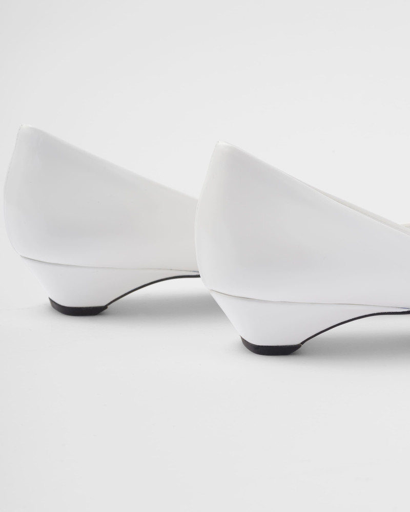 Brushed leather pumps with floral appliqués 7