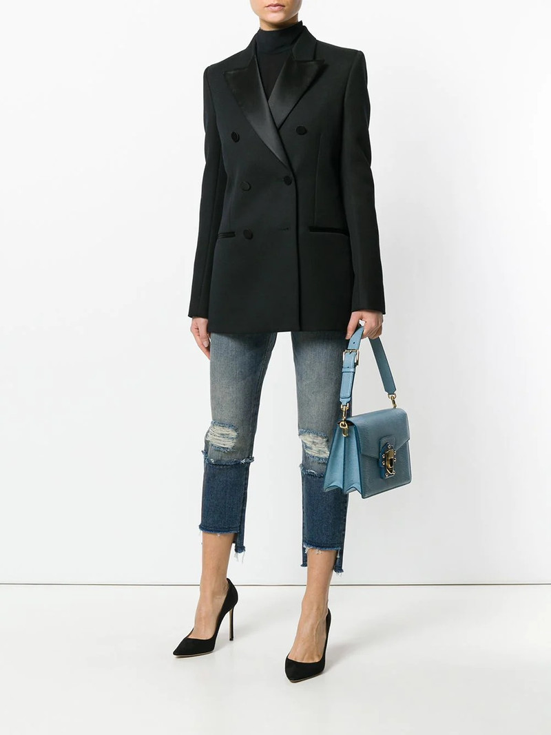 Dolce & Gabbana deconstructed logo patch jeans outlook