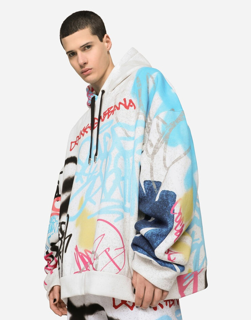Hoodie with spray-paint graffiti print 1