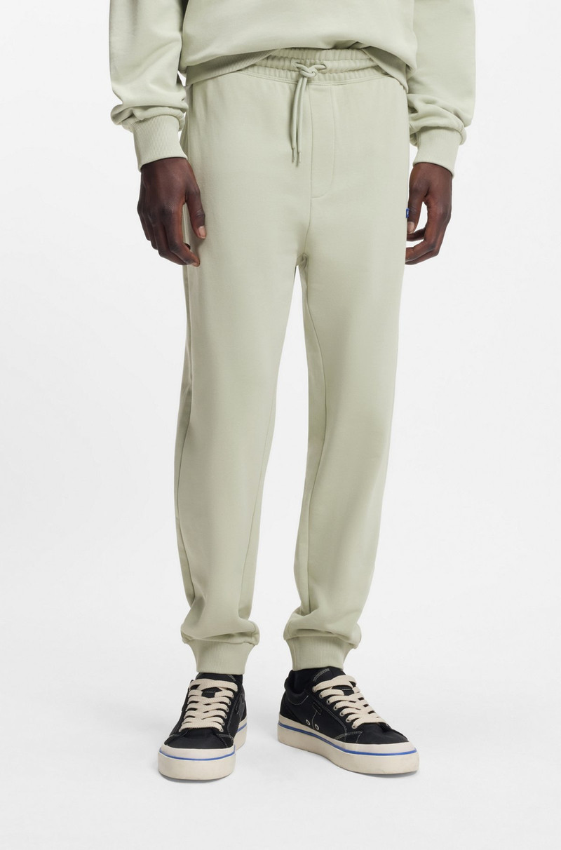 COTTON-TERRY SWEATPANTS WITH LOGO PATCH 2